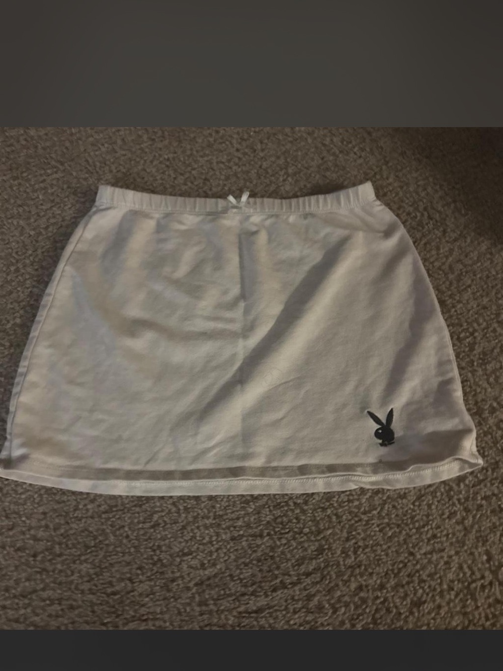 PLAYBOY tan Mini Skirt with Black Bunny Patch